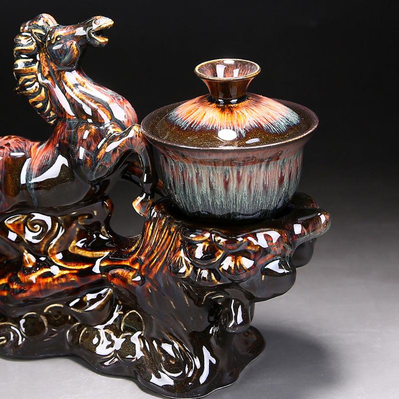 Kiln-changed relief horse anti-scalding automatic tea brewing artifact