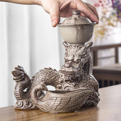 Embossed dragon tea set | Creative rotating automatic tea infuser